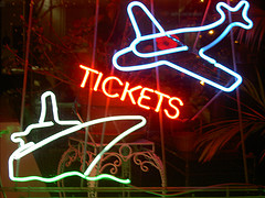 Neon sign of a travel agency
